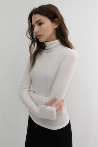 ESSENTIAL ROLL NECK TOP OFF WHITE