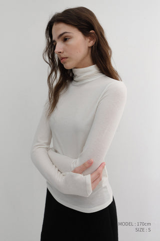 ESSENTIAL ROLL NECK TOP OFF WHITE