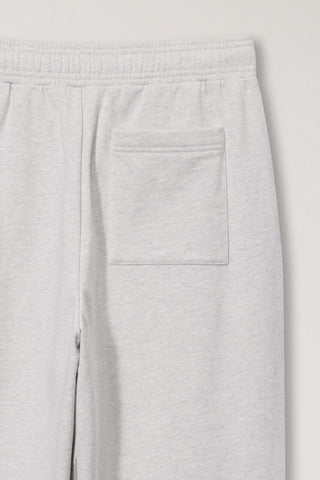 UNISEX LEATHER LOGO WIDE SWEAT PANTS OATMEAL MELANGE