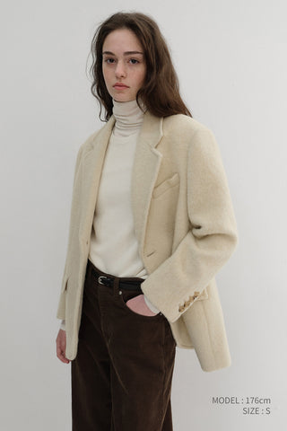 ESSENTIAL ROLL NECK TOP OFF WHITE