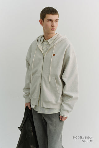 UNISEX LEATHER LOGO ZIP-UP HOODIE OATMEAL MELANGE