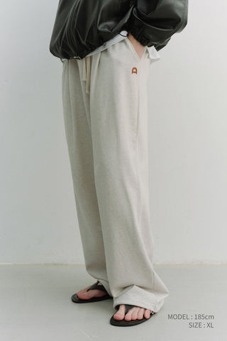 UNISEX LEATHER LOGO WIDE SWEAT PANTS OATMEAL MELANGE