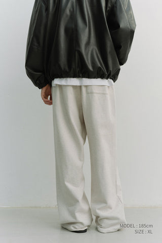 UNISEX LEATHER LOGO WIDE SWEAT PANTS OATMEAL MELANGE